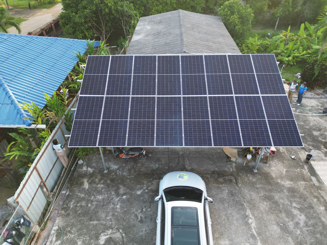 The array from above: 32 panels on a raised carport frame