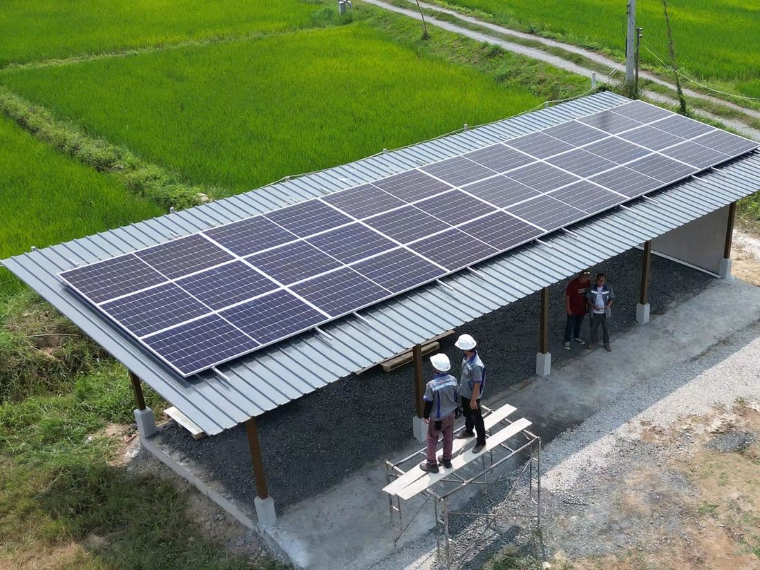 The array on the shed roof beside the rice fields