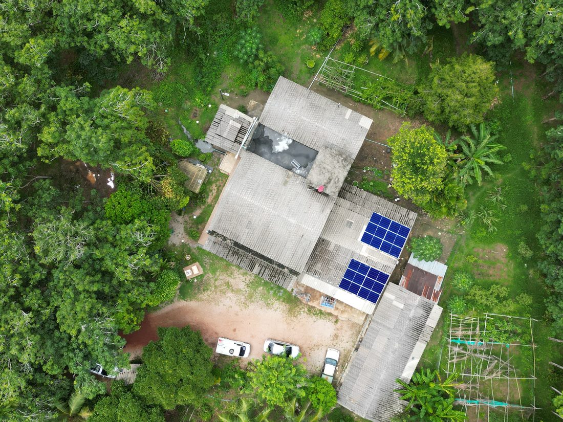 The array from above: two groups on a house roof among trees