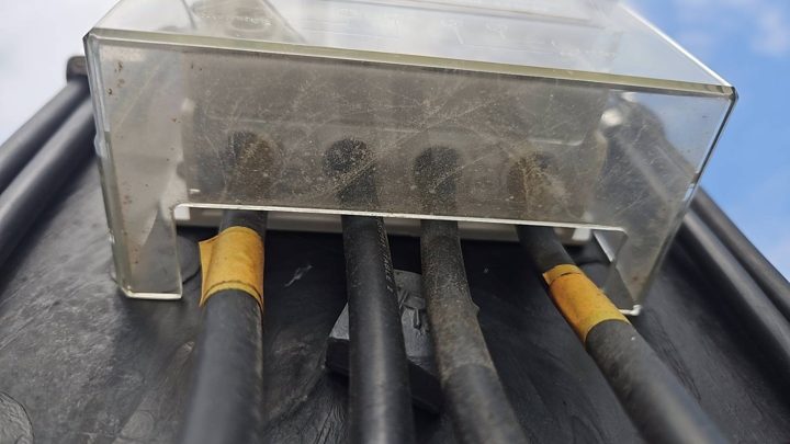 Cable entry under the meter terminal cover