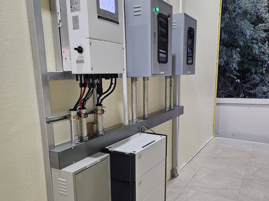 Hybrid inverter with stacked battery, mounted on a steel frame at a Solar ESS site